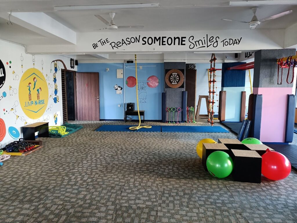 Spacious Jump-n-Rise fitness center for preschoolers, filled with colorful equipment, ready for fun and safe play."