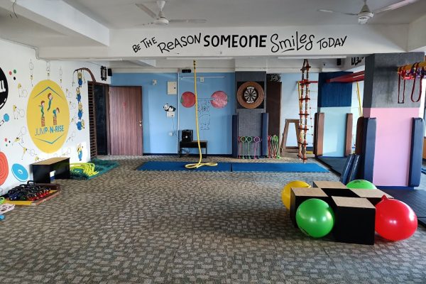 : The spacious and vibrant gym area of Jump-n-Rise designed for kids' activities.